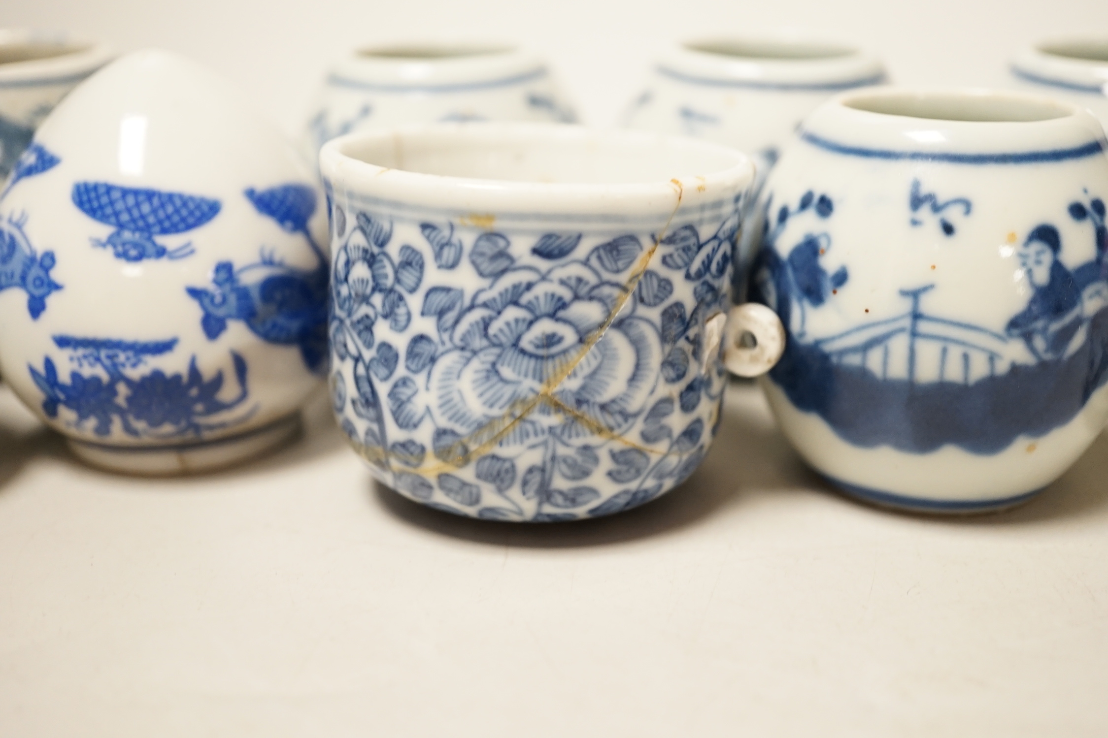 Ten Chinese porcelain bird feeders, 19th/20th century, 4.5cm